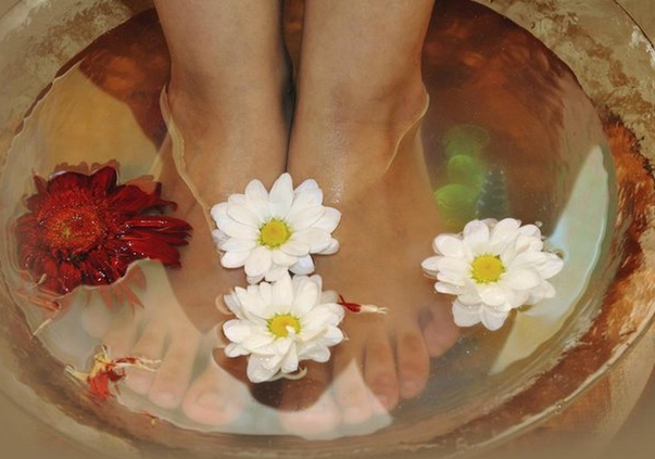 resting feet in bathtub